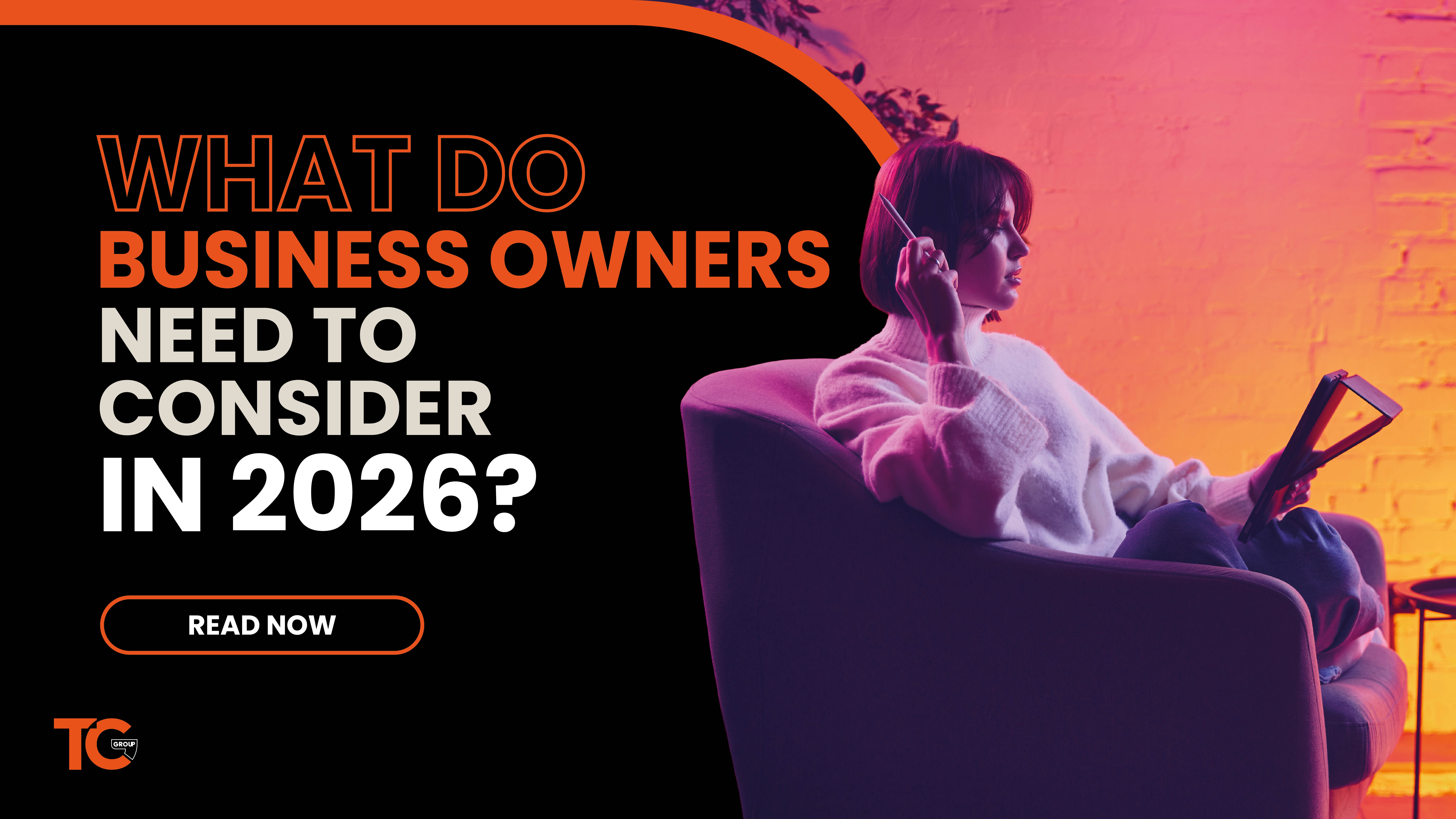 Woman sat on a chair with a tablet